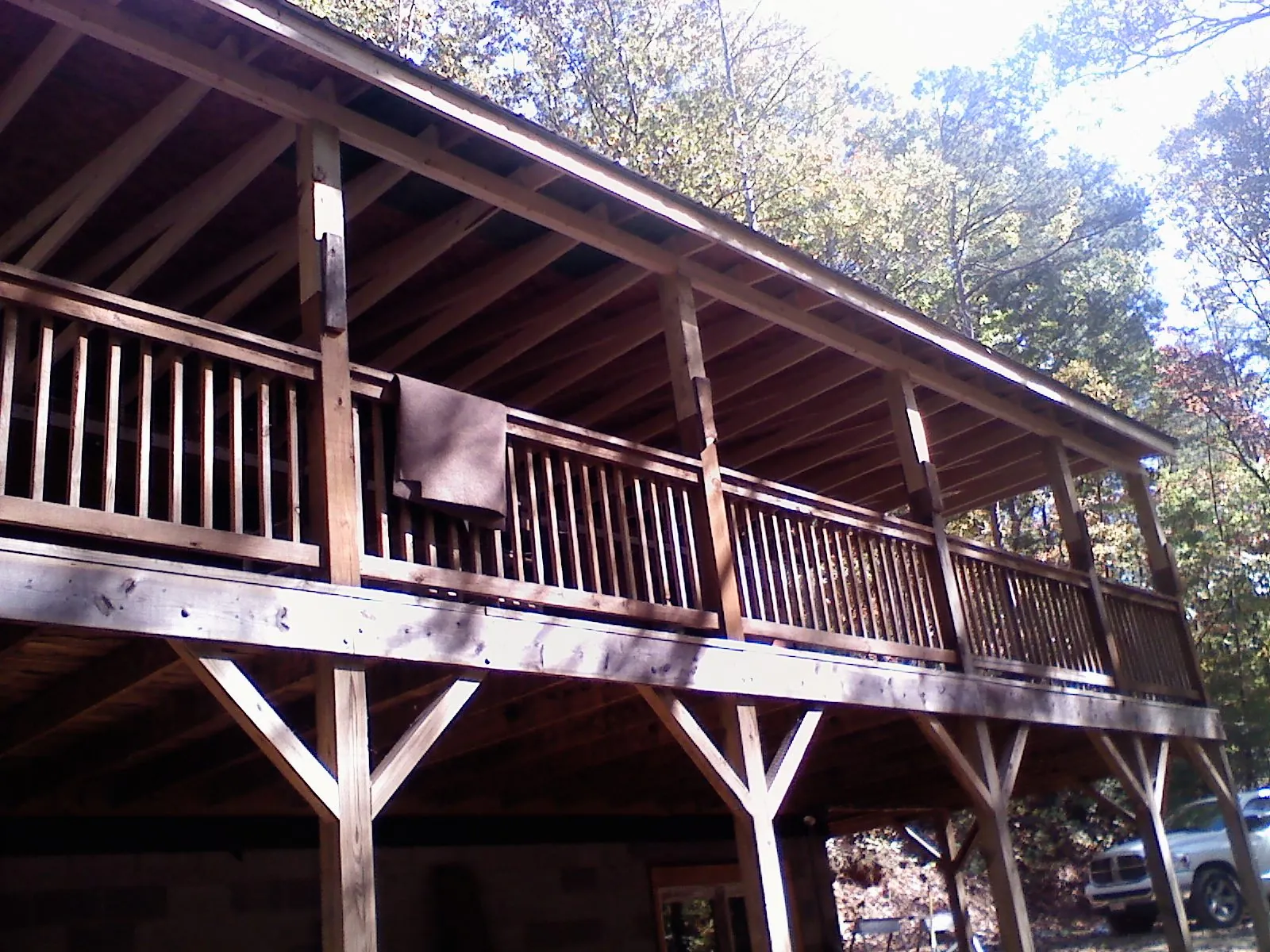 Timber framing under a new elevated porch and deck — Roof Leak Repair in La Jolla by Roofing Brothers